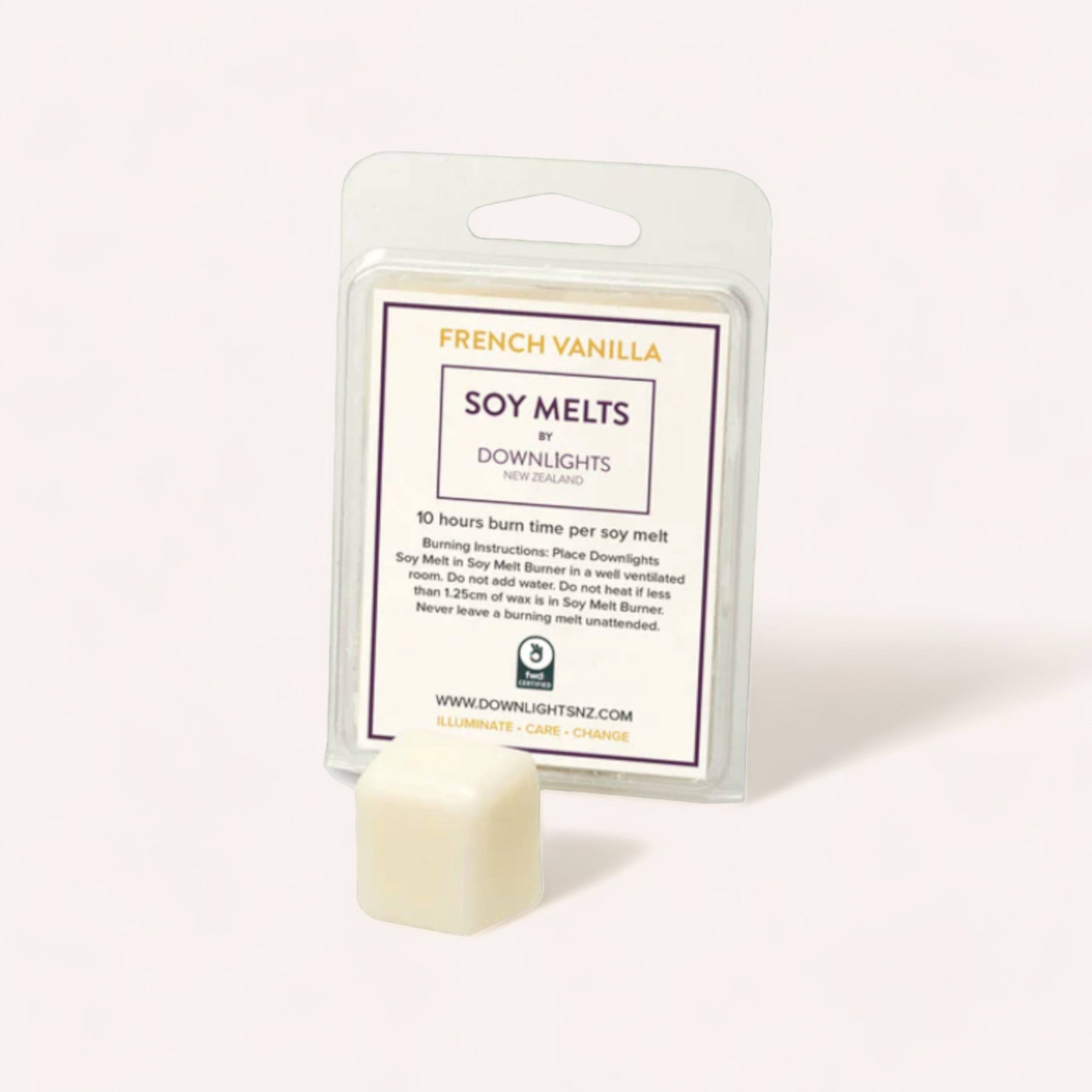 A package of French Vanilla Soy Melts by Downlights with a single cube placed in front of it on a light background, highlighting an eco-friendly soy wax melt product.