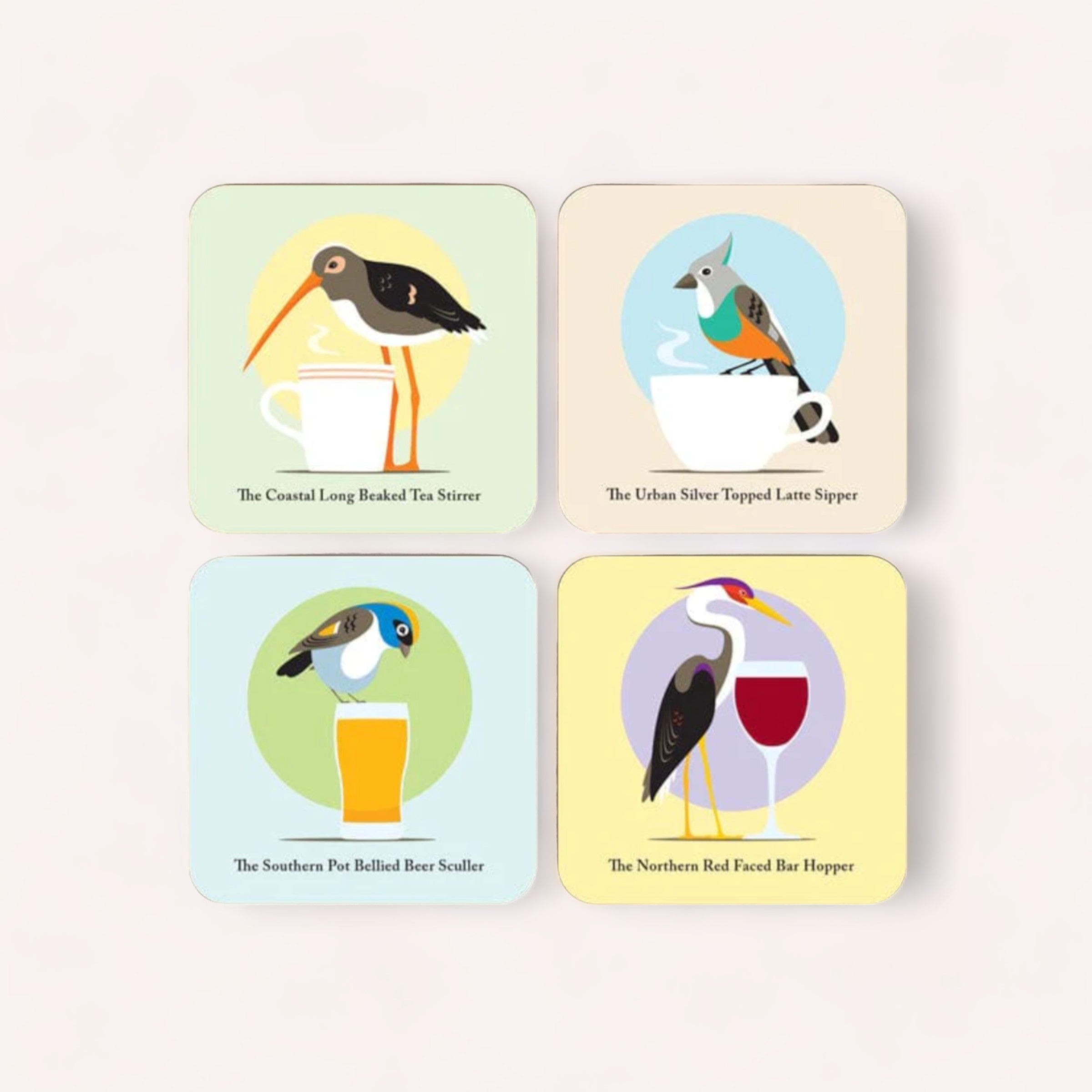 A whimsical set of Modern Natives Coaster Set by Glenn Jones art illustrations depicting birds with playful names based on drinking habits, each paired with a different beverage and beautifully showcased on hardboard coasters, a product of Glenn Jones Accessories.