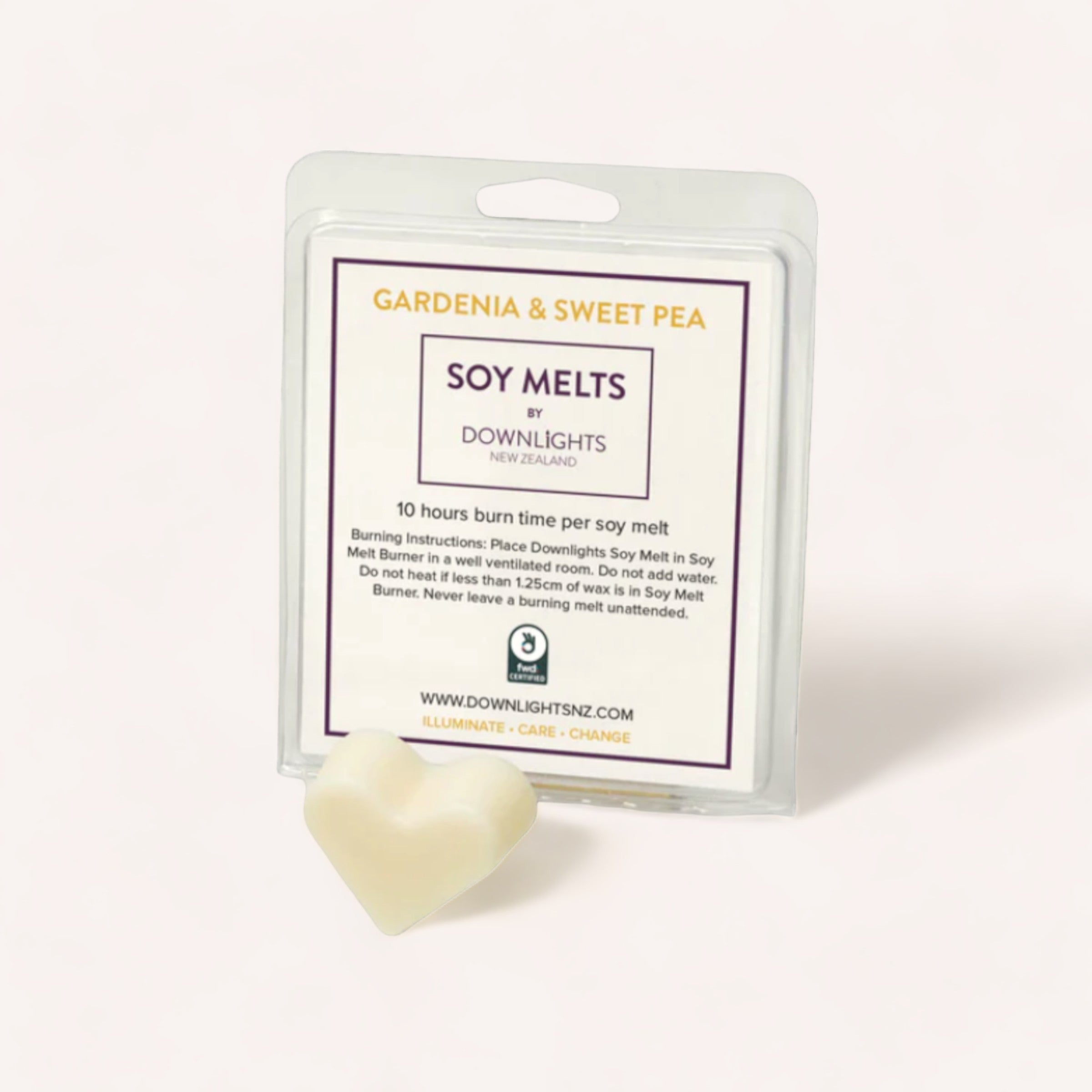 A pack of Gardenia & Sweet Pea Heart Soy Melts by Downlights, with a heart-shaped soy melt in front of it.