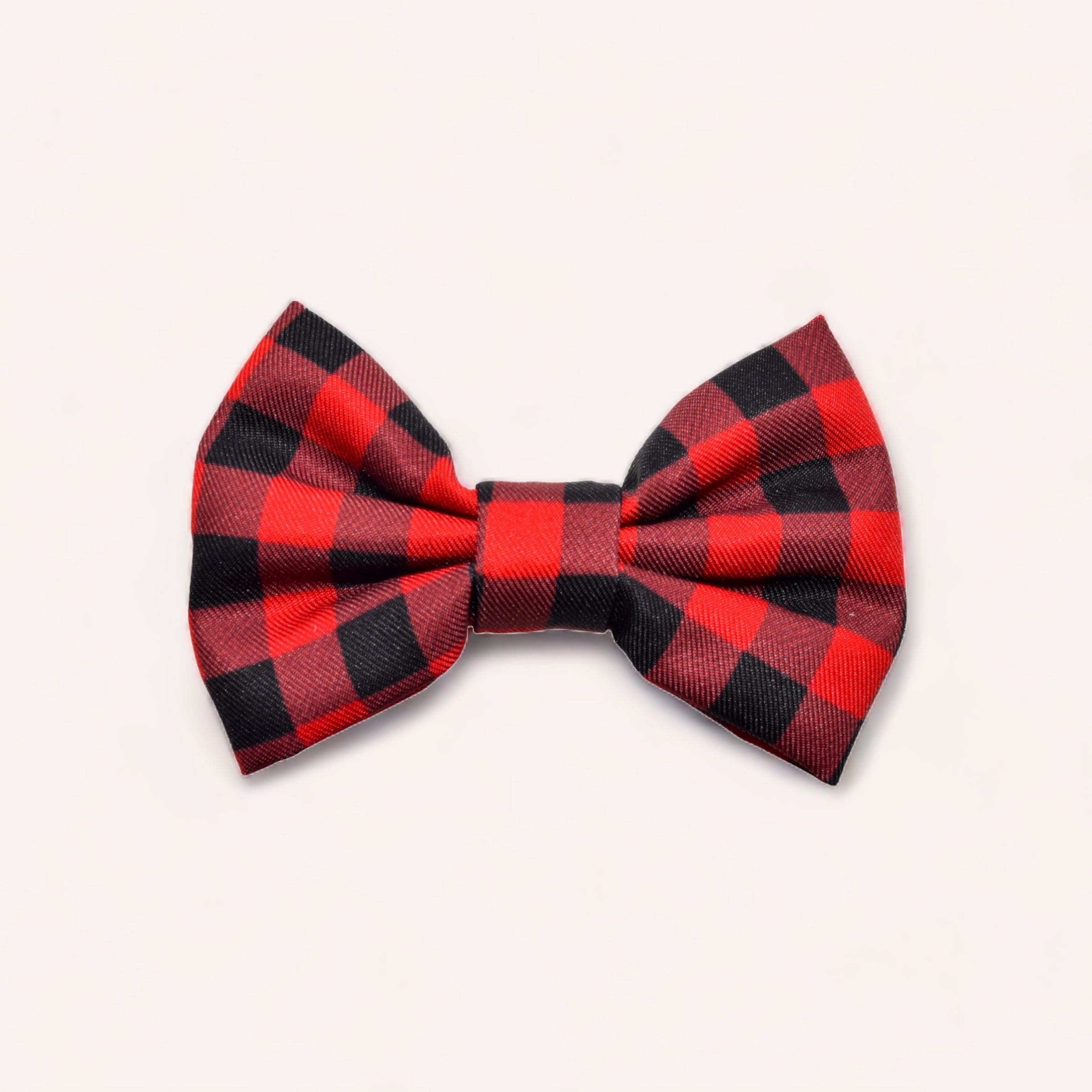 A classic red and black checkered Buffalo Bow by Wolves of Wellington for dapper dogs, isolated on a white background.