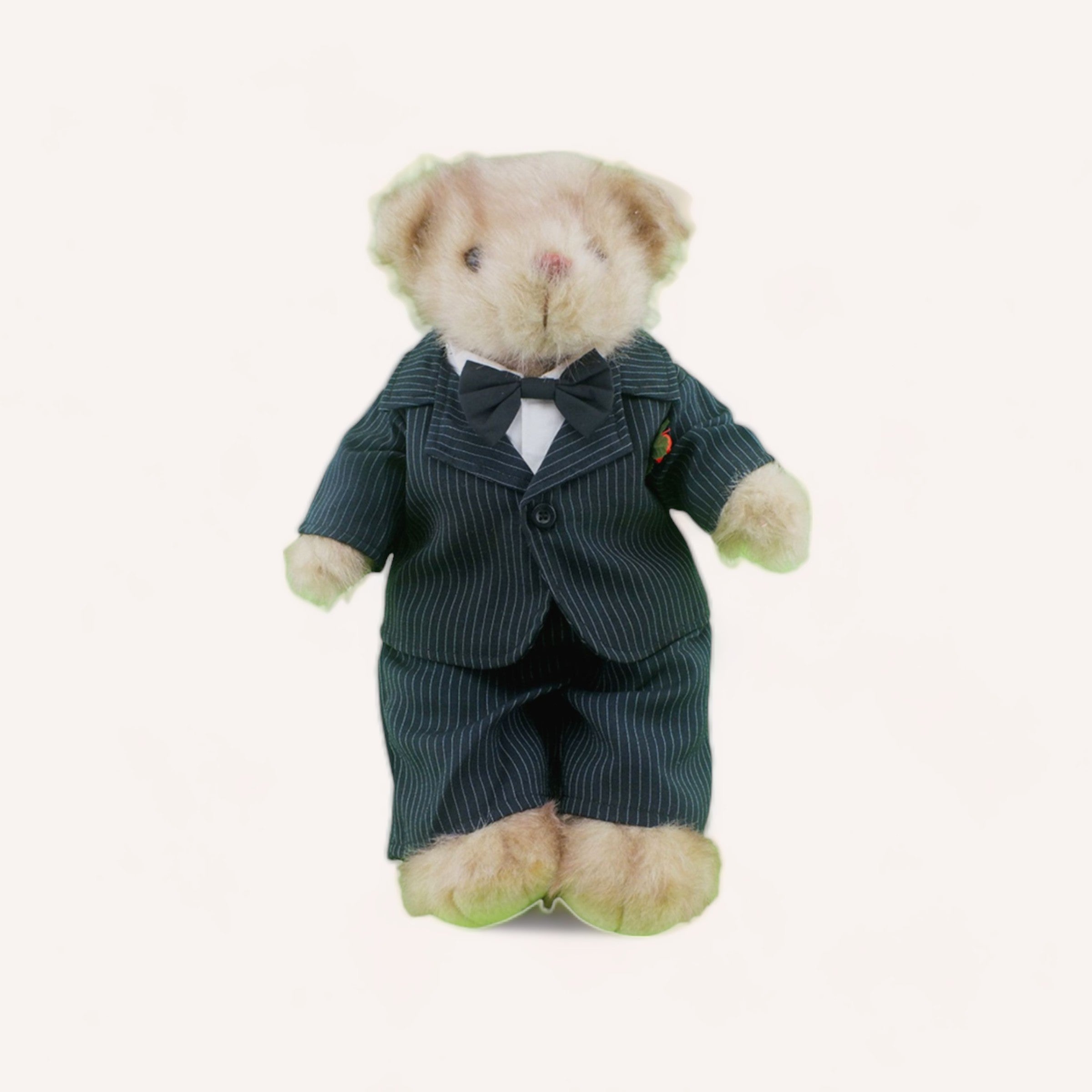 An elegant Bear Wedding Groom Outfit dressed in a 4 piece suit with a bow tie, ready for a formal event by The Teddy Factory.