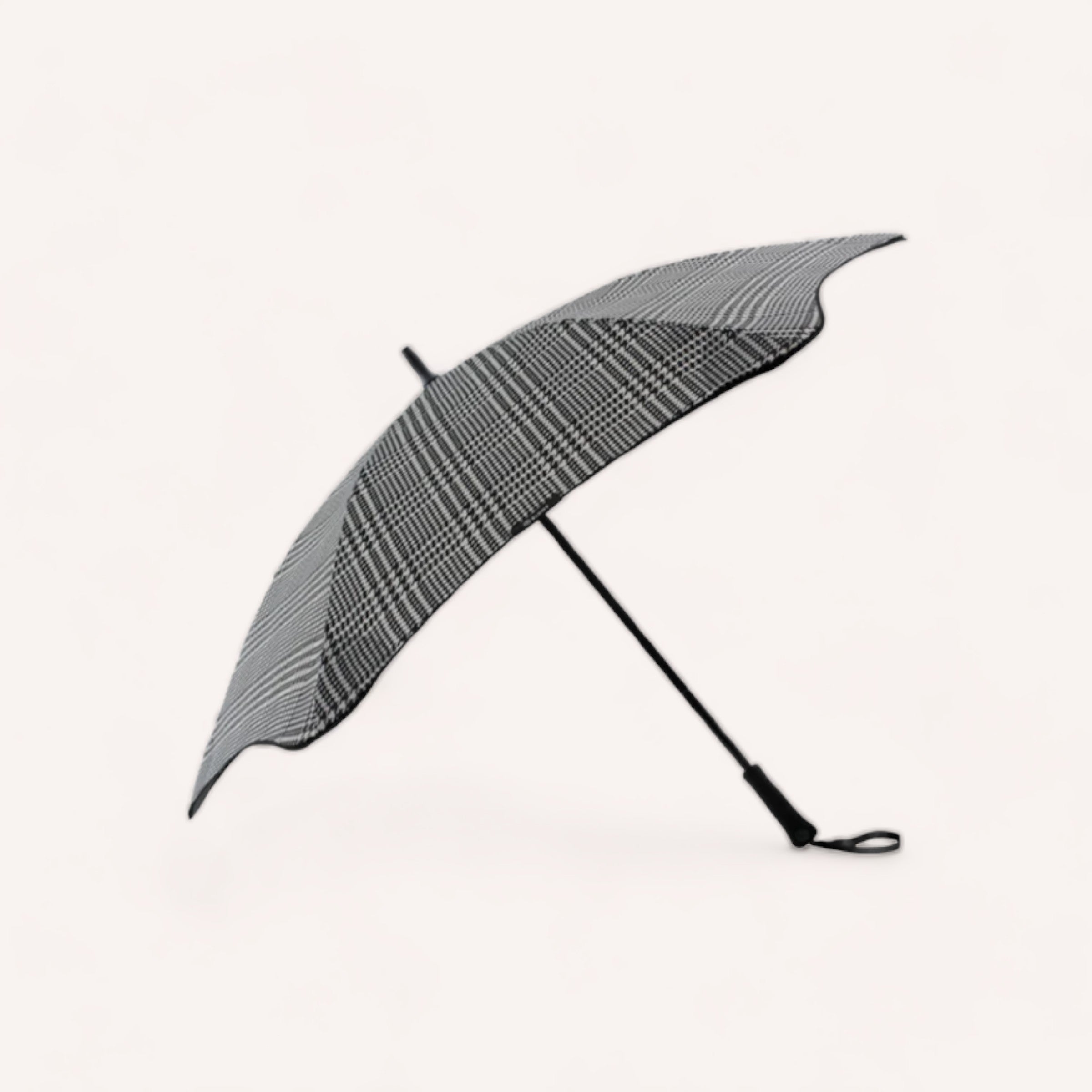 A BLUNT Metro Umbrella Houndstooth - Limited Edition open and angled against a plain white background.