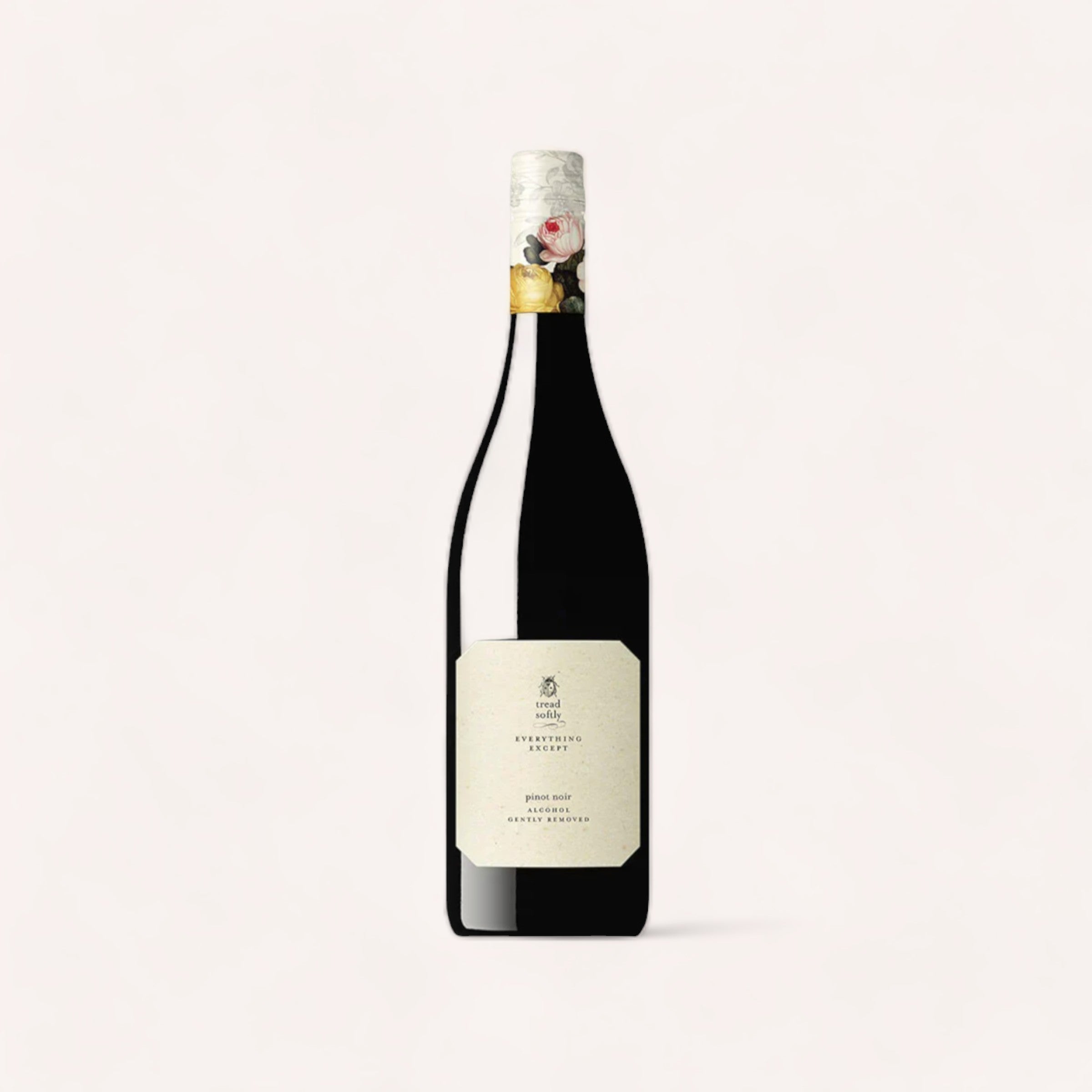 An elegant bottle of Non-Alcoholic Pinot Noir by Tread Softly with a vintage label, sealed with a traditional cork and foil against a clean, neutral background.