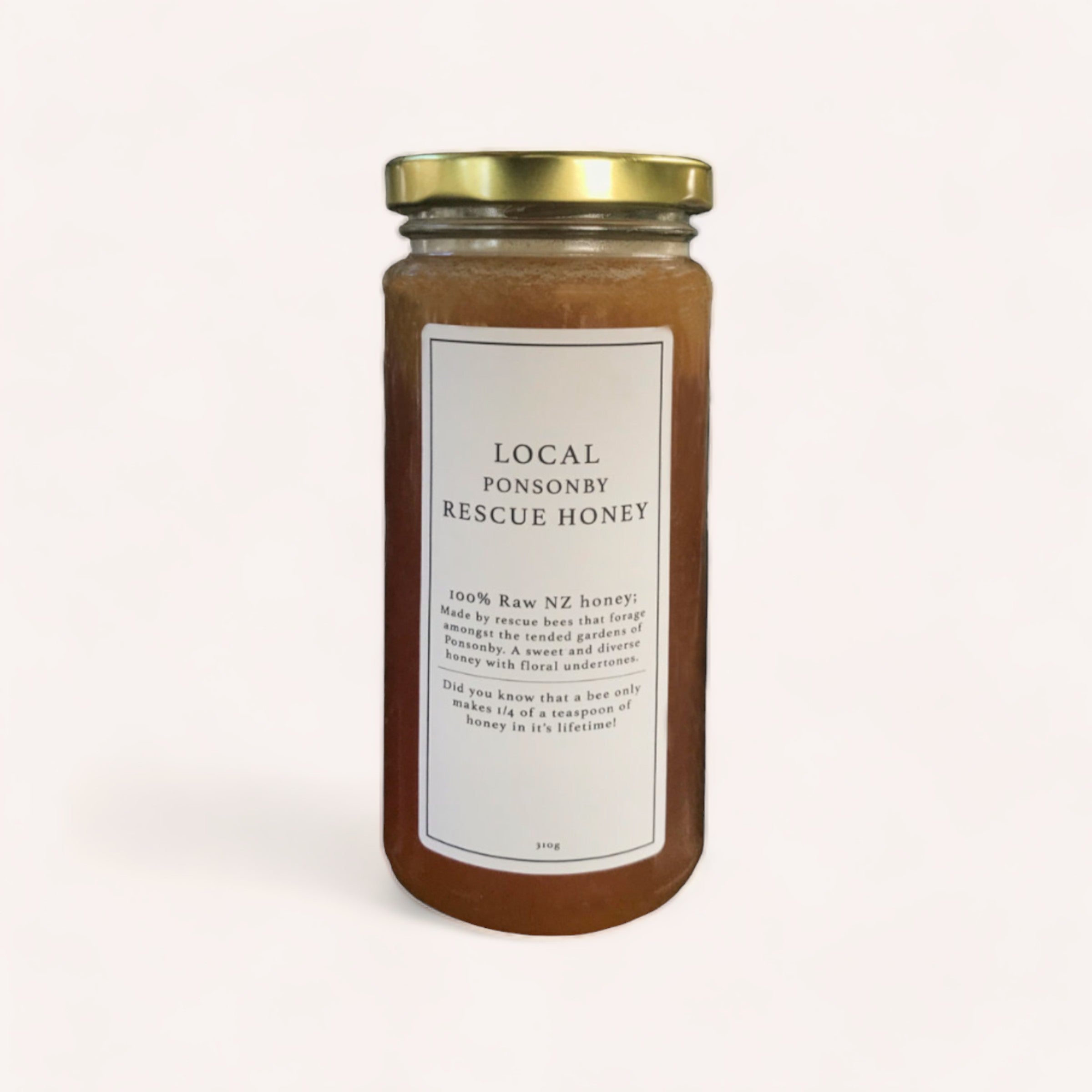 A jar of "Ponsonby Rescue Honey by Bees Up Top," labeled as 100% raw natural honey, against a clean, white background.