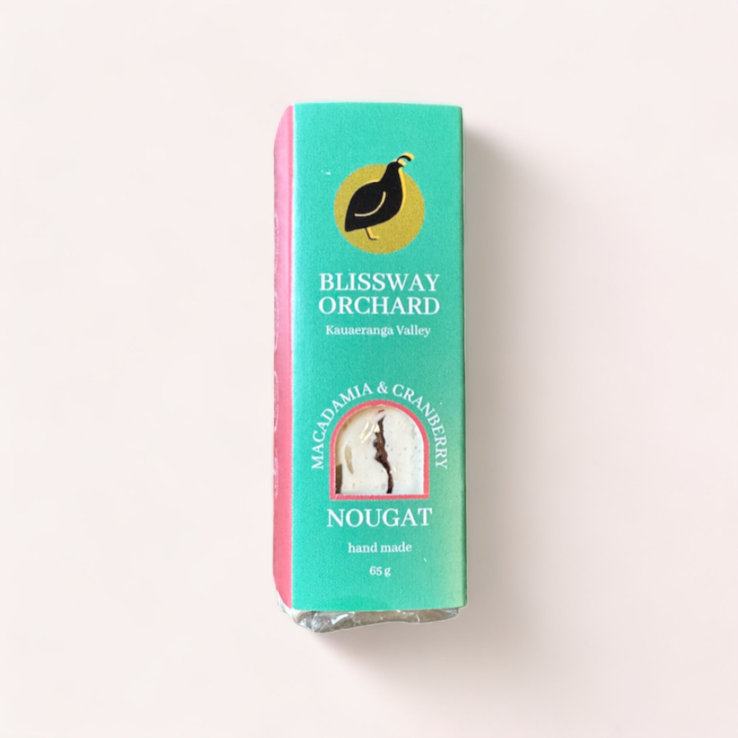 A package of Macadamia & Cranberry Nougat by Blissway Orchard, featuring handmade nougat with New Zealand macadamias & cranberry, 65g.