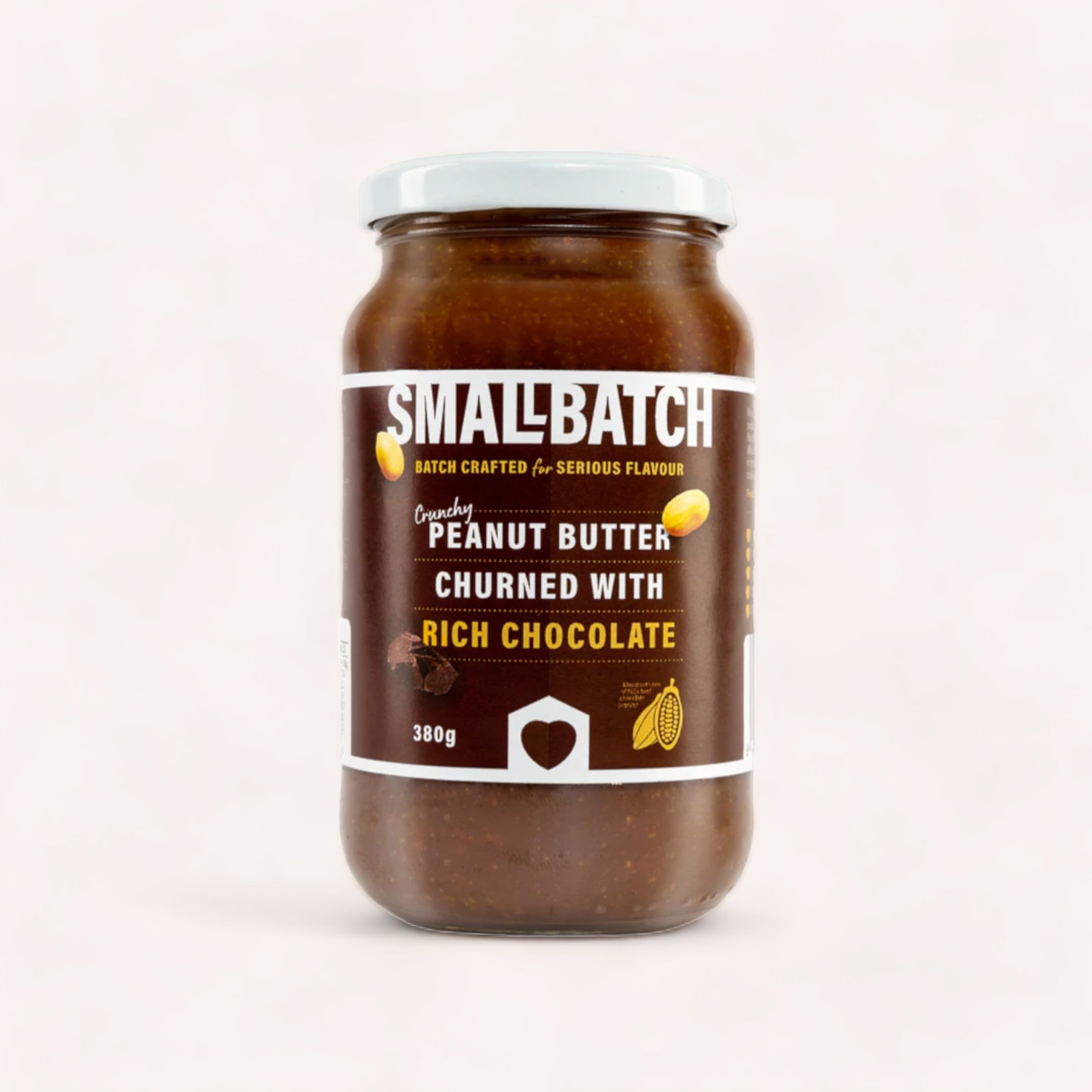 A jar of Chocolate Peanut Butter by Smallbatch churned with rich chocolate and high-oleic peanuts against a neutral background.