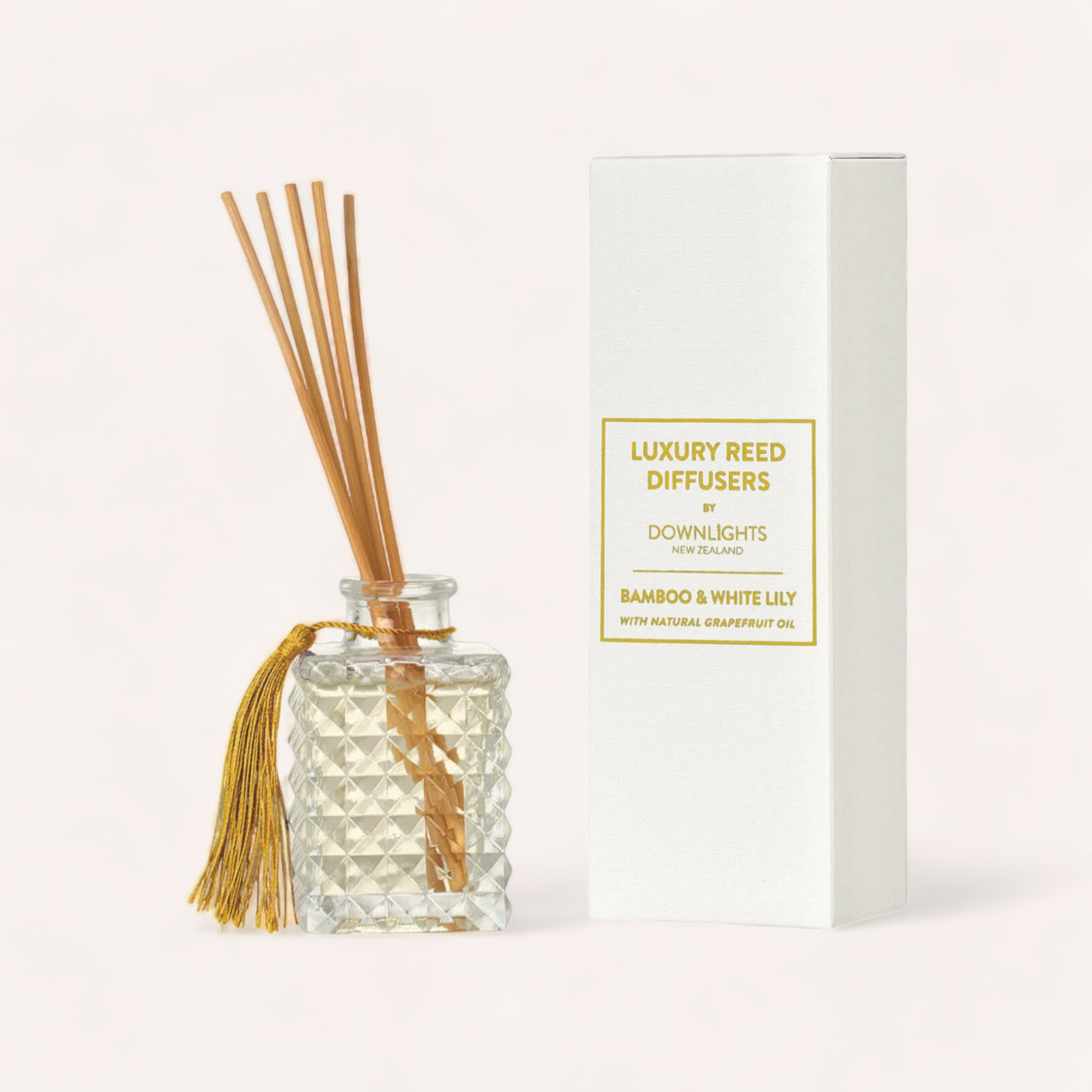 Elegant Bamboo & White Lily Diffuser by Downlights, packaged in a minimalist white box with a luxury label, perfect for adding a subtle and sophisticated aroma to any room.