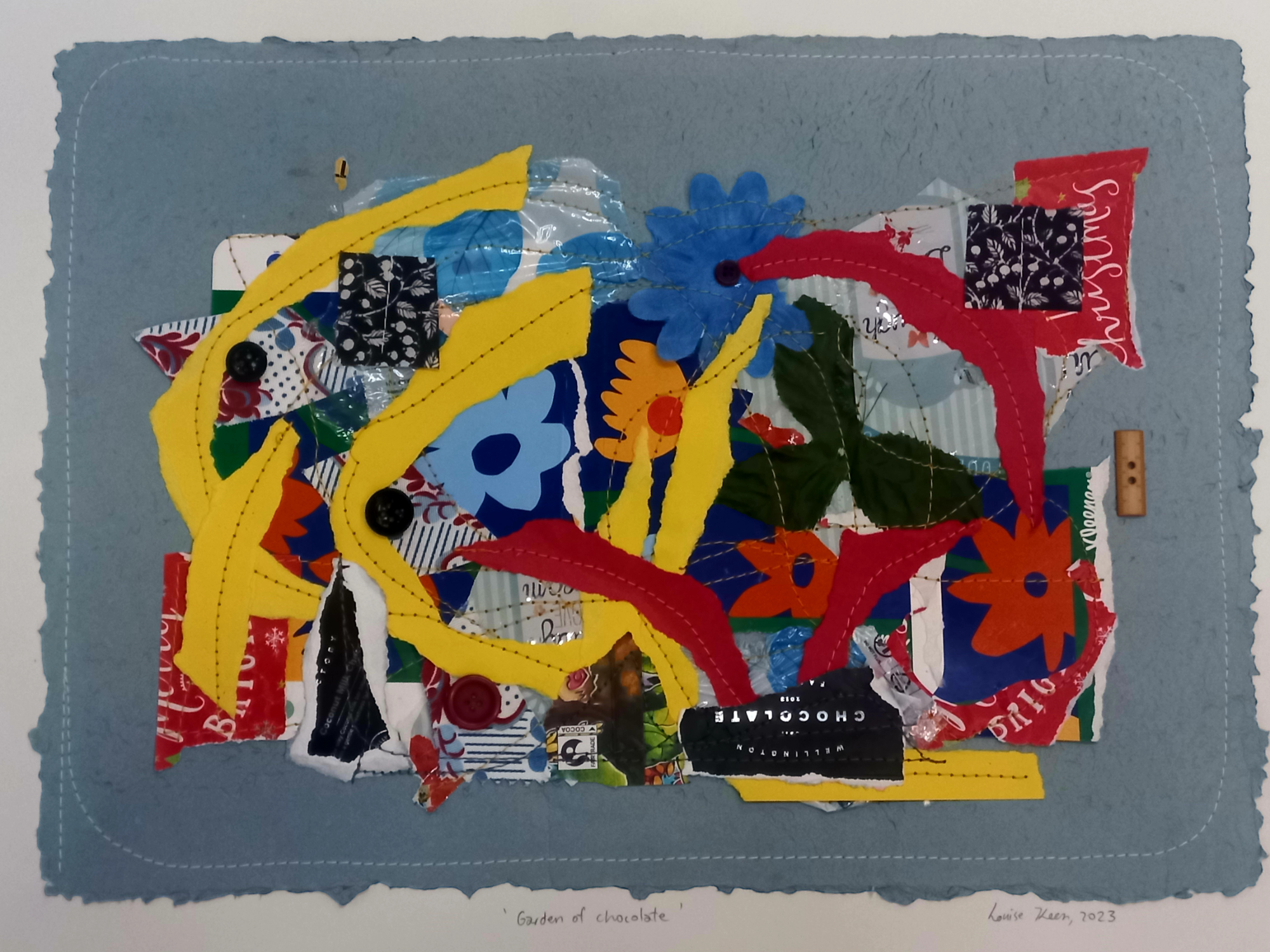 A vibrant and colorful mixed media collage featuring abstract floral shapes, various patterns, and dynamic forms, all creatively assembled on a blue textured background made of handmade paper, complete with a title and artist's signature by Louise Keen's Garden of Chocolate.