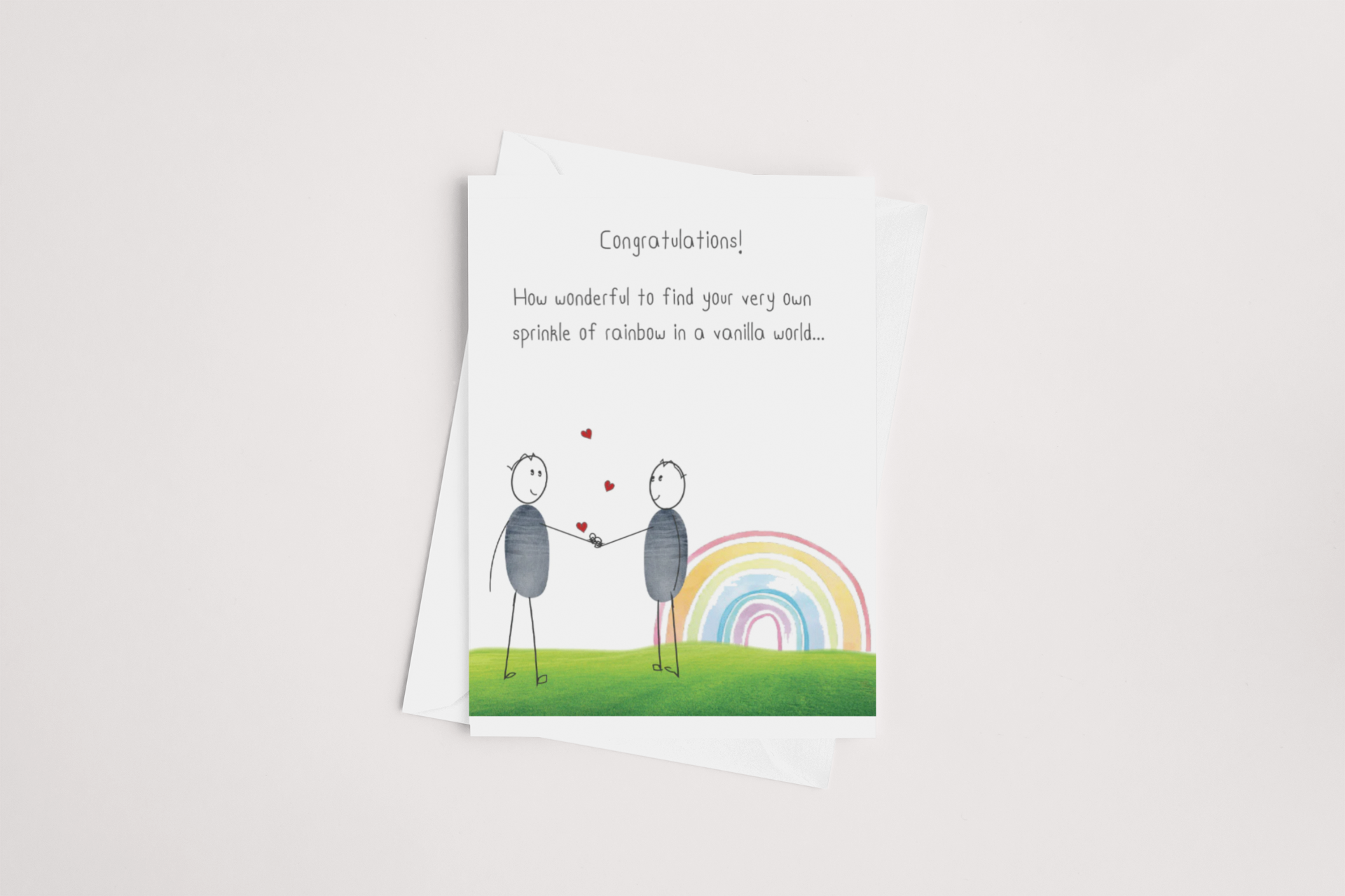 Greeting card featuring a whimsical illustration of two figures holding hands with a colorful rainbow in the background, and the text "congratulations! how wonderful to find your very own icandy Sprinkle of Rainbow Card.