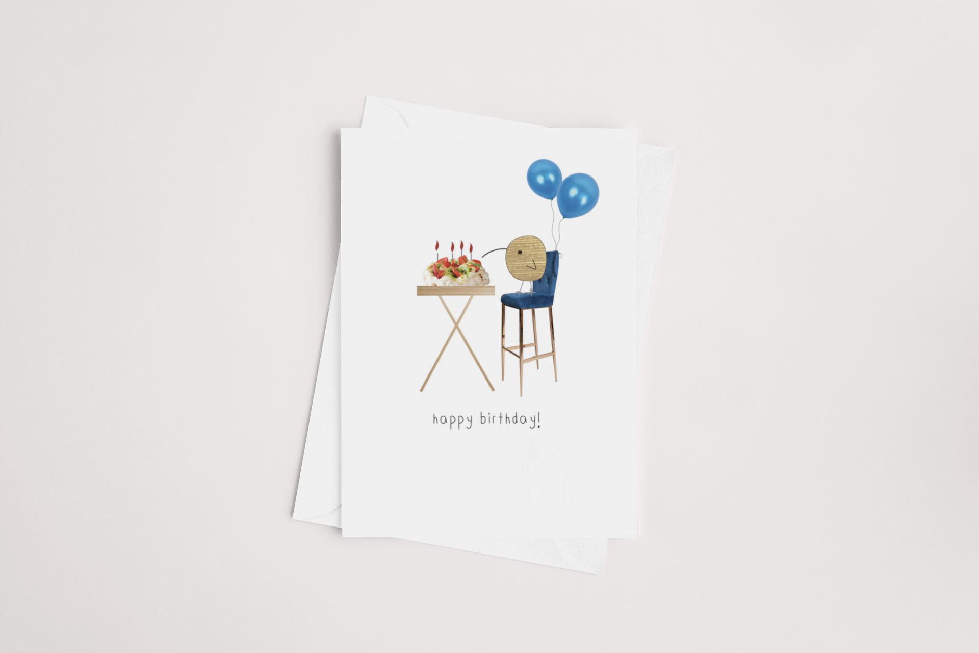 A Kiwi Pavlova Birthday Card, a product of icandy from New Zealand, with a whimsical illustration featuring a smiling round face, a table with a cake, and two balloons on a clean white background, with the words