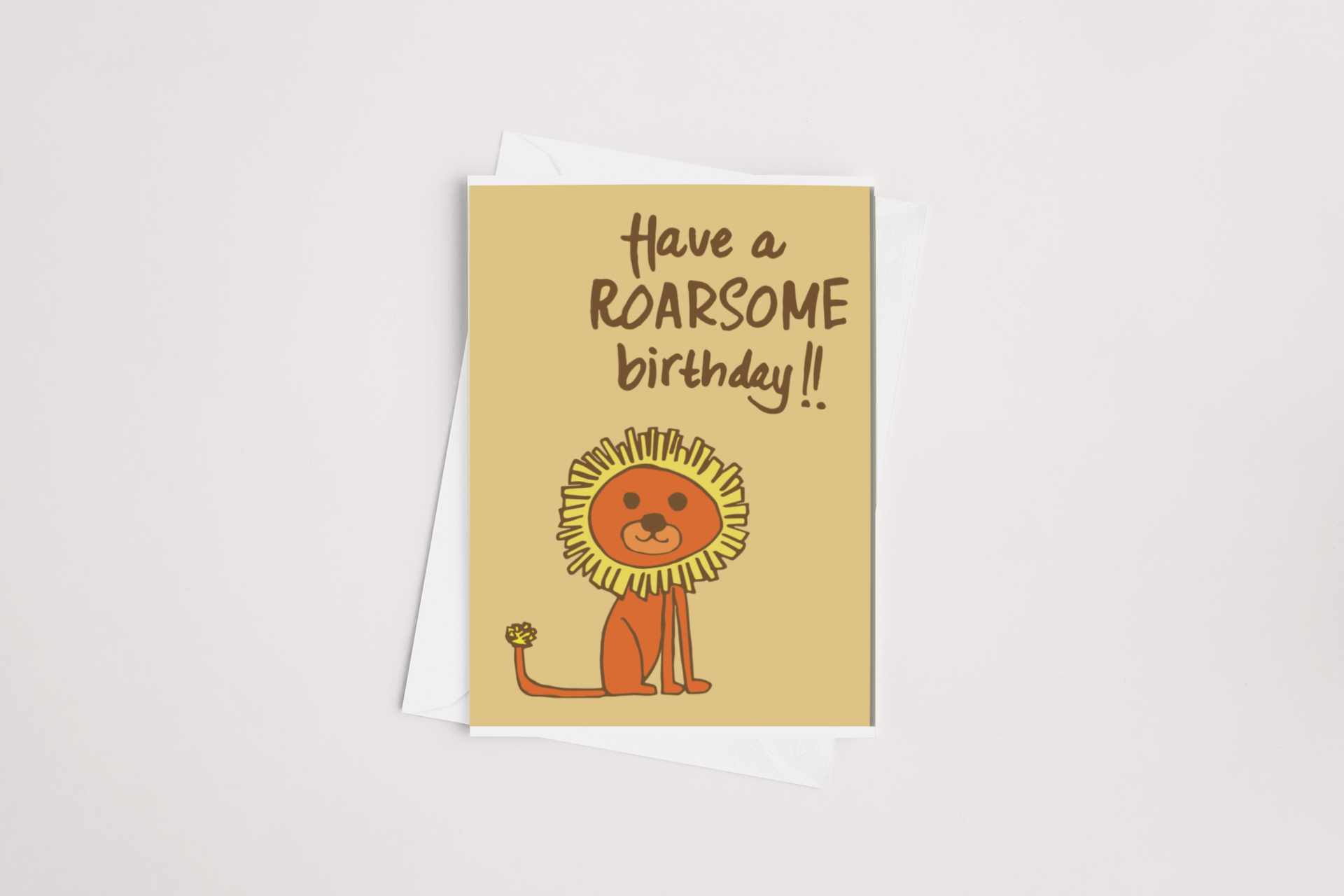 A cheerful birthday greeting card from Tuesday Print, featuring a cartoon lion with the punny greeting "have a Roarsome Birthday!!" against a yellow background.