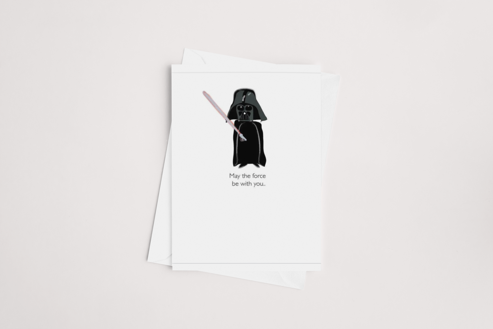 A May the Force be With You Card, product of New Zealand, featuring an illustration of Darth Vader with a lightsaber and the caption "May the force be with you." from icandy.