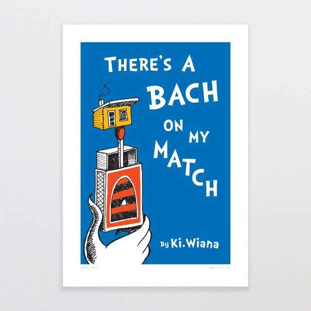 A playful and artistic poster featuring a visual pun with the phrase "there's a Local Yarn on my Glenn Jones," showing a matchbox labeled "bach" with a piano keyboard design, held by a hand.