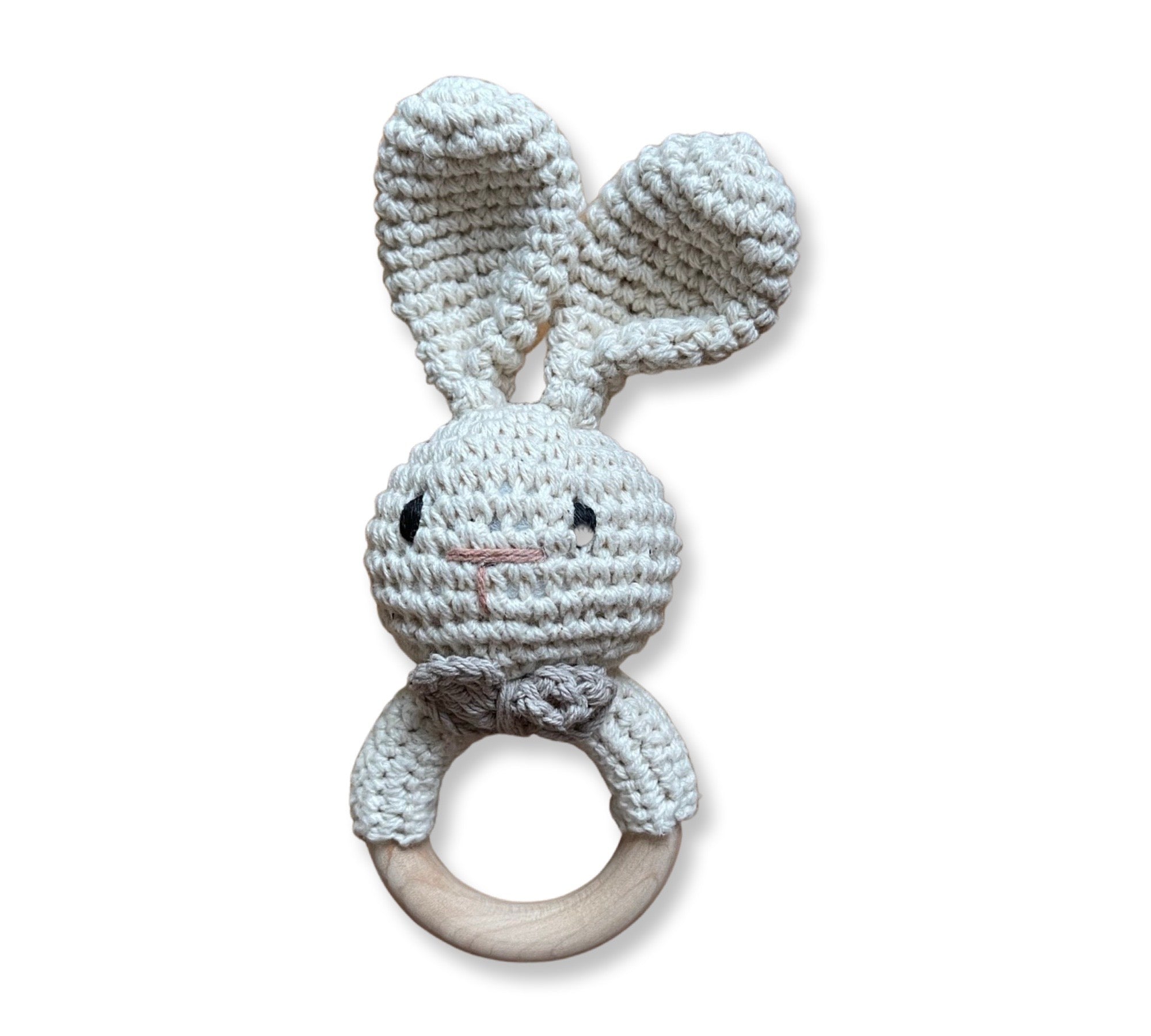 Handcrafted crochet rabbit with a wooden teething ring, perfect as a New Arrival baby giftbox item by giftbox co.