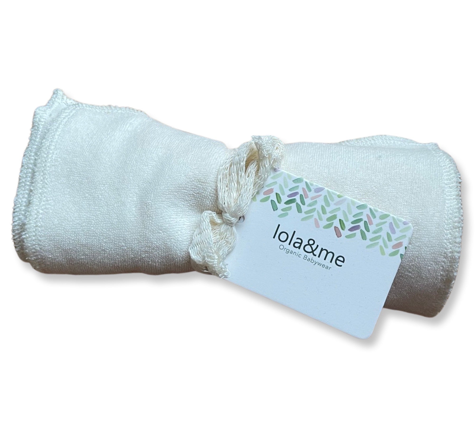 A rolled-up organic bamboo towel secured with a knotted rope and an attached brand label reading "giftbox co. organic bamboo," ideal for a New Arrival giftbox.