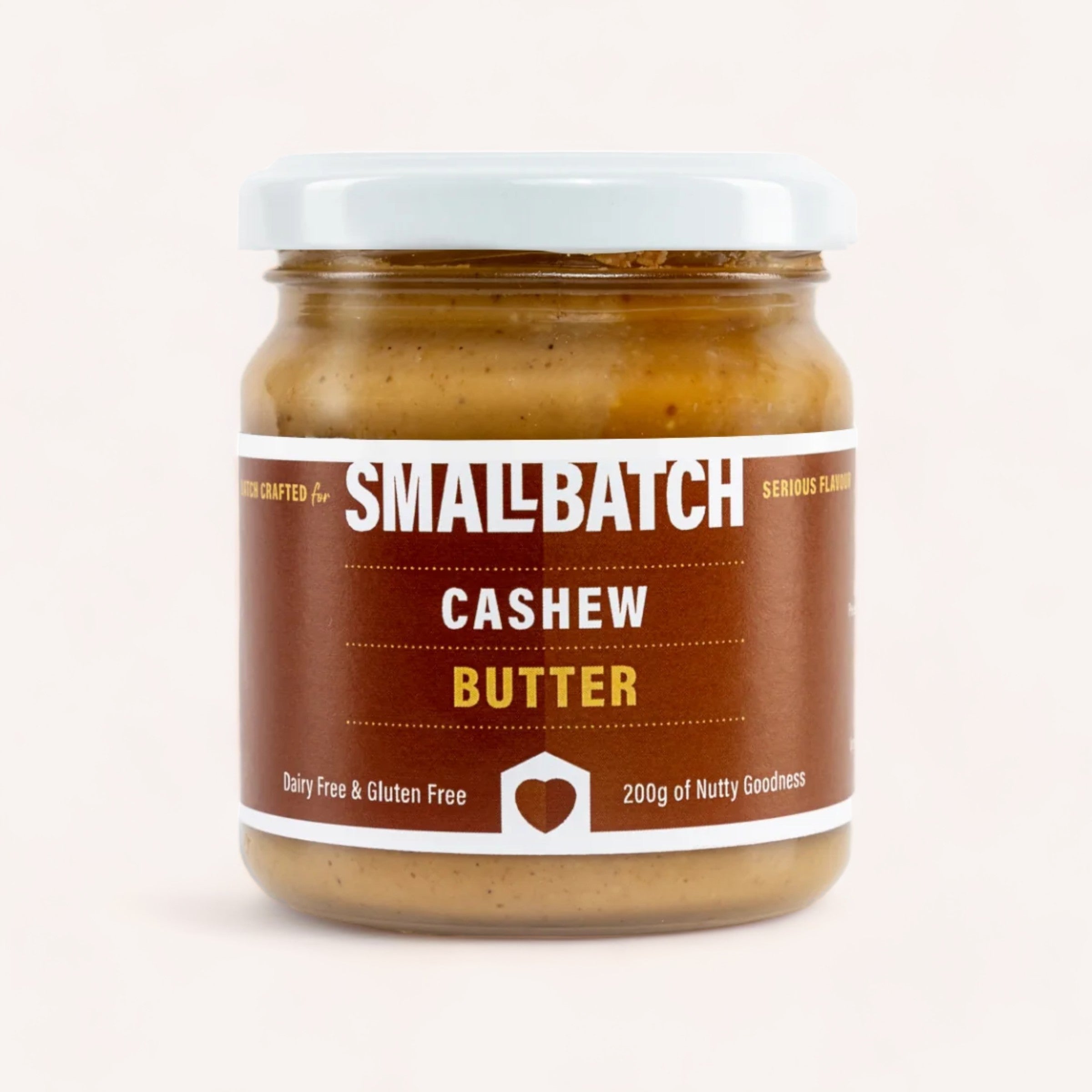 A jar of Smallbatch Cashew Butter made in Mount Maunganui with a simple and clean label, touting "dairy free & gluten free" and "200g of nutty goodness.