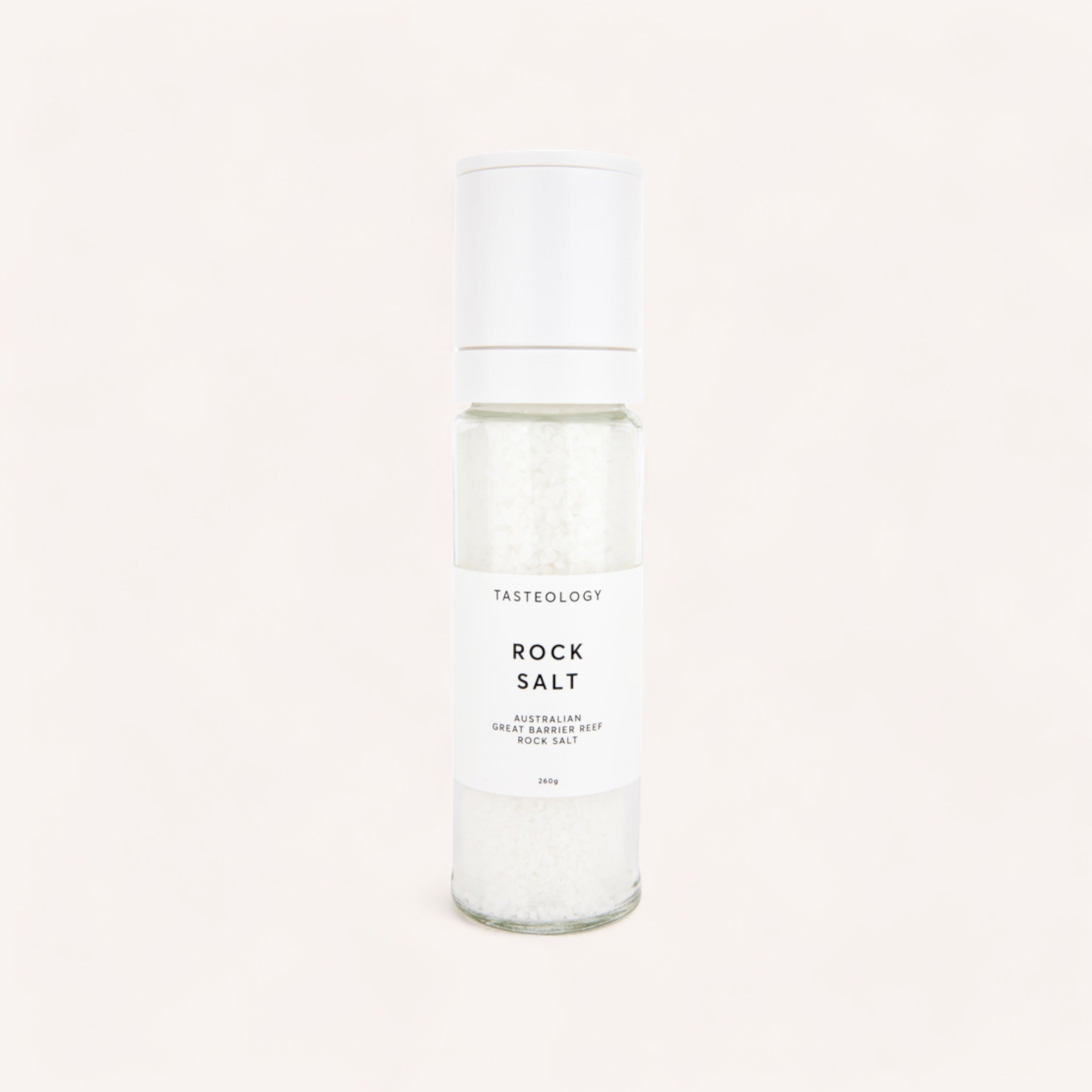 A minimalist-designed bottle of Great Barrier Reef Rock Salt by Tasteology against a clean, off-white background.