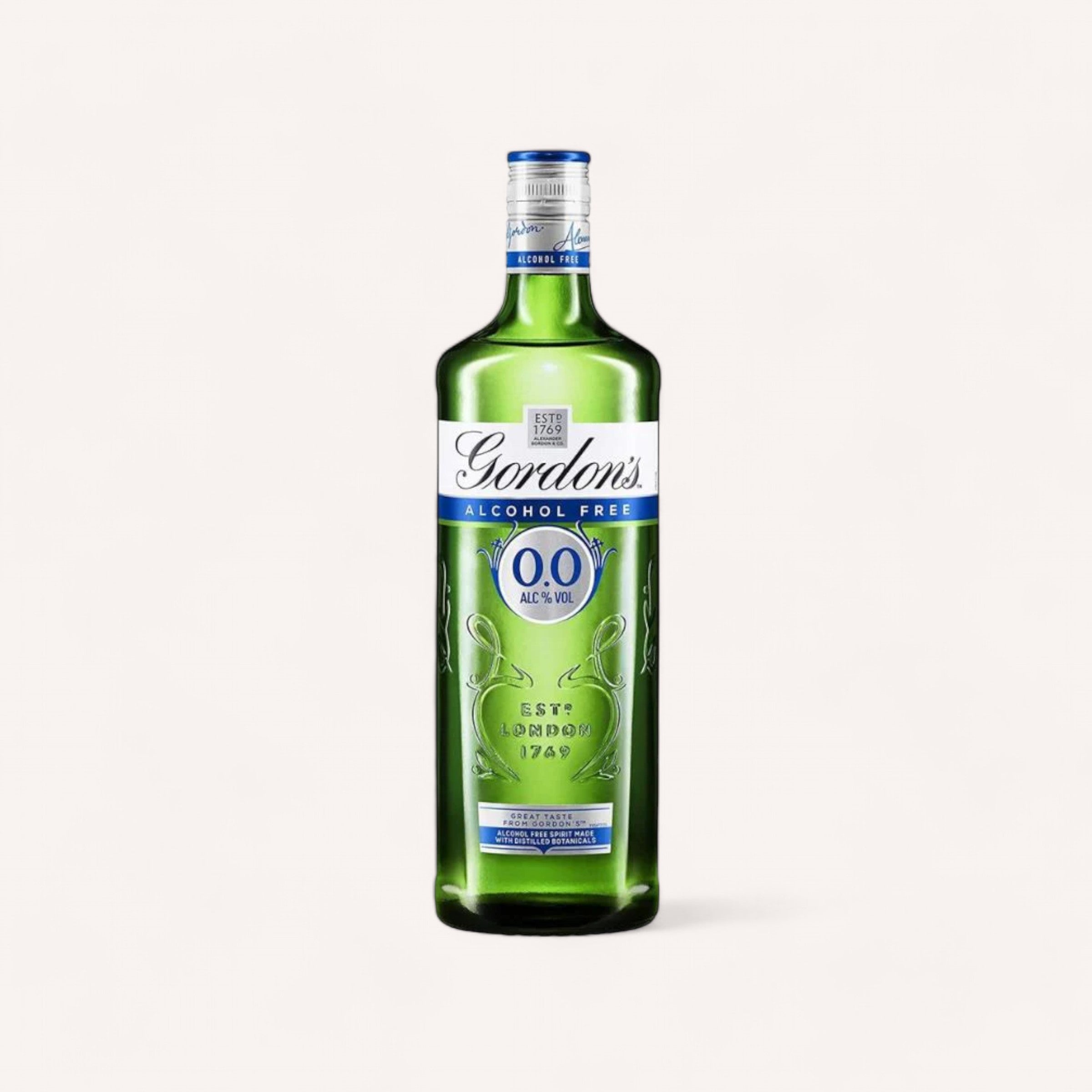 A green bottle of Gordon's 0% Gin stands against a plain white background. The bottle has a blue cap, and the label features the brand name "Gordon's" in white script, along with "Zero Alcohol" in blue. Below, there's a "0.0%" indication and the establishment year, 1769, in white text on a blue ribbon—perfect for G&T lovers.