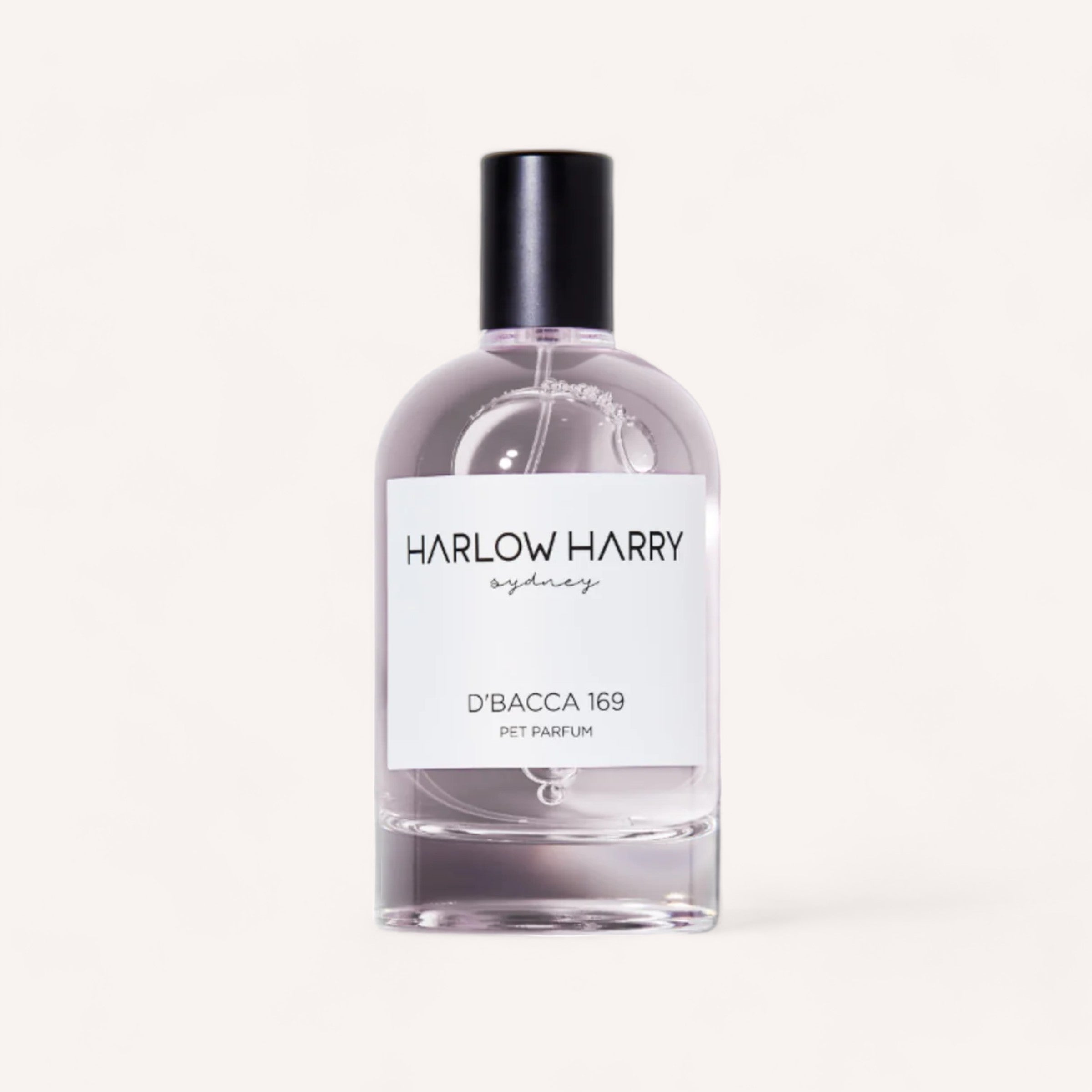 A sleek bottle of D'bacca 169 Dog Perfume by Harlow Harry with cedar musky notes against a clean, white background.
