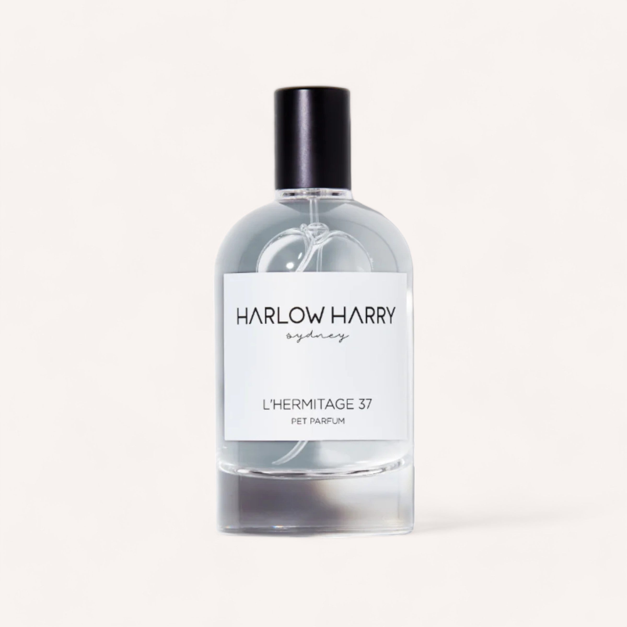 A sleek bottle of L'hermitage 37 Dog Perfume by Harlow Harry for dogs against a clean, white background.