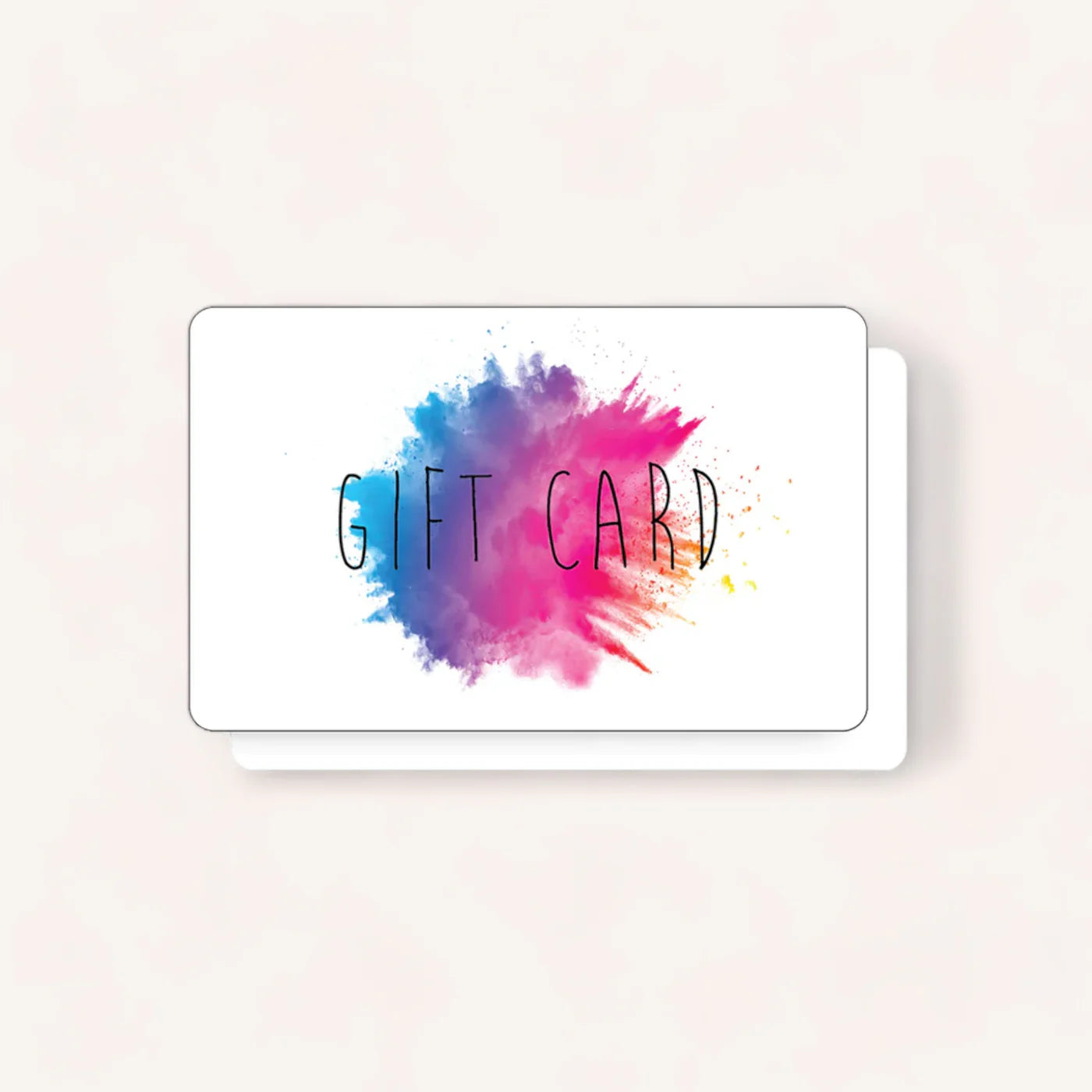 A giftbox co. Gift Card showcasing a white background with vibrant splatters of blue, pink, and purple paint at the center. The phrase "GIFT CARD" is elegantly displayed over the splatter in a thin, whimsical black font. The card is presented on top of another identical card, with edges peeking through.