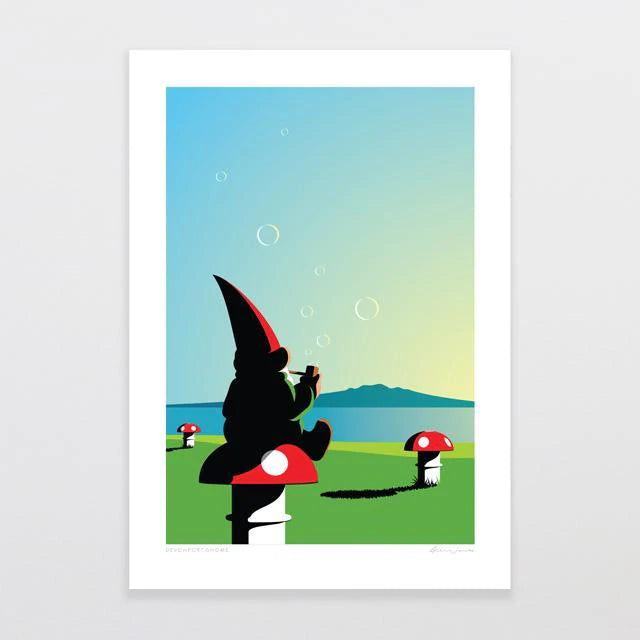 The Devonport Gnome by Glenn Jones features a whimsical illustration where a garden gnome, donning a red hat, sits atop a large red and white mushroom. The gnome blows bubbles under a clear blue sky, with a serene lake and distant mountain range in the background, while other mushrooms are scattered across the grassy landscape.