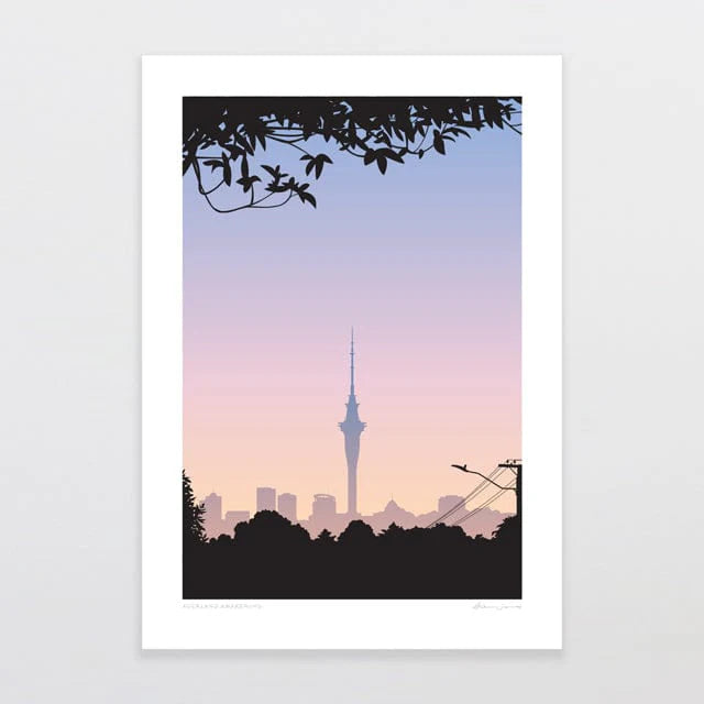 Presenting "Auckland Awakening by Glenn Jones," a framed print scene capturing the silhouette of Auckland City Centre at dusk. The iconic Sky Tower stands out prominently against a sky transitioning from pink to purple, framed by tree branches above. Rooftops with power lines appear in the foreground as the softly illuminated skyline completes this stunning artwork by Glenn Jones.